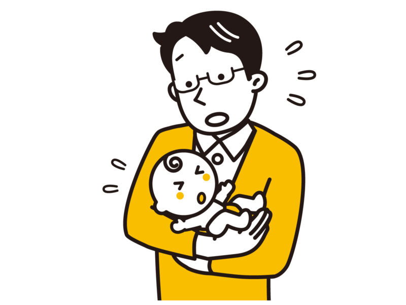 寝かしつけをする父親